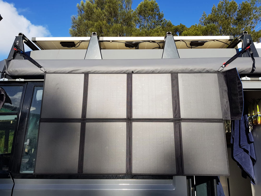Solar panels on top and on side of bus