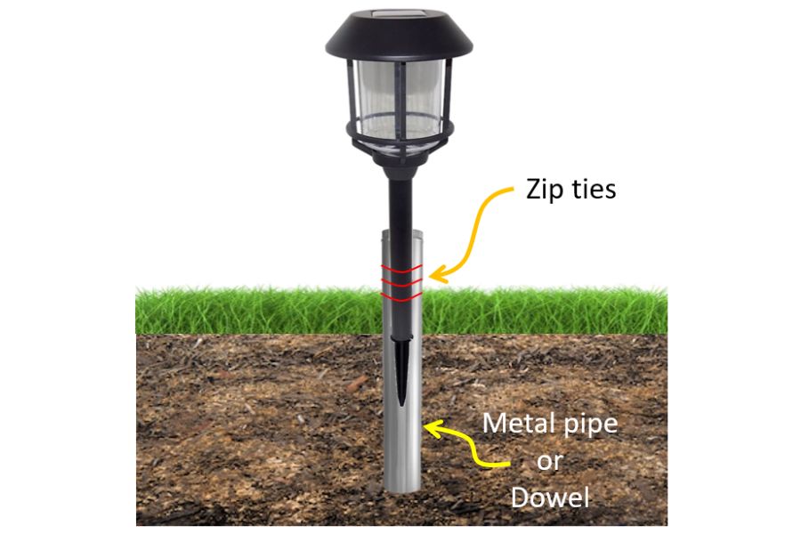 Attach your solar light to a pipe or wooden dowel to provide additional support