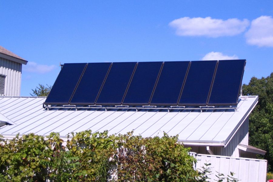 Solar collectors installed on house roof