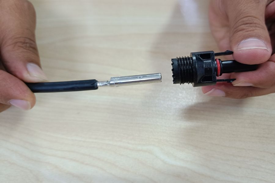 Insert the female pin into the open end on the male connecto