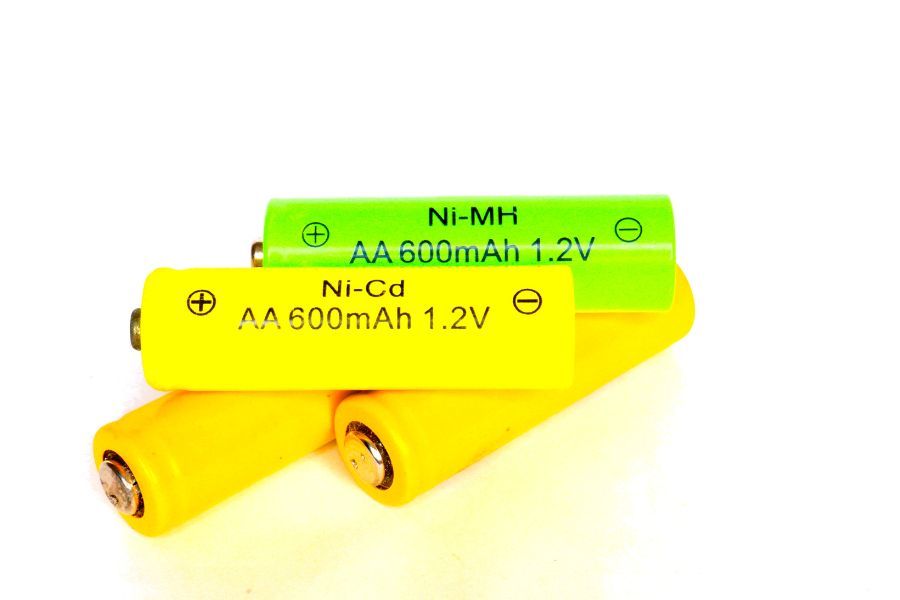 NiCd and NiMH batteries on light background