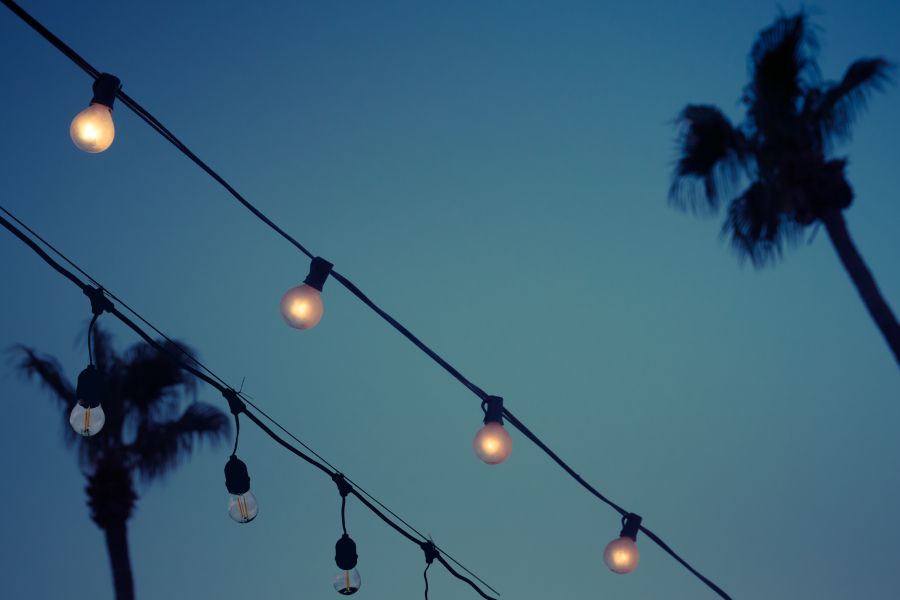 Partially turned off string lights at dawn