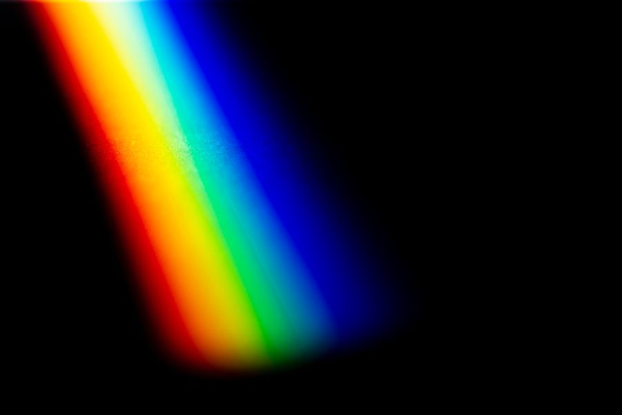 Light colors spectrum on black background 